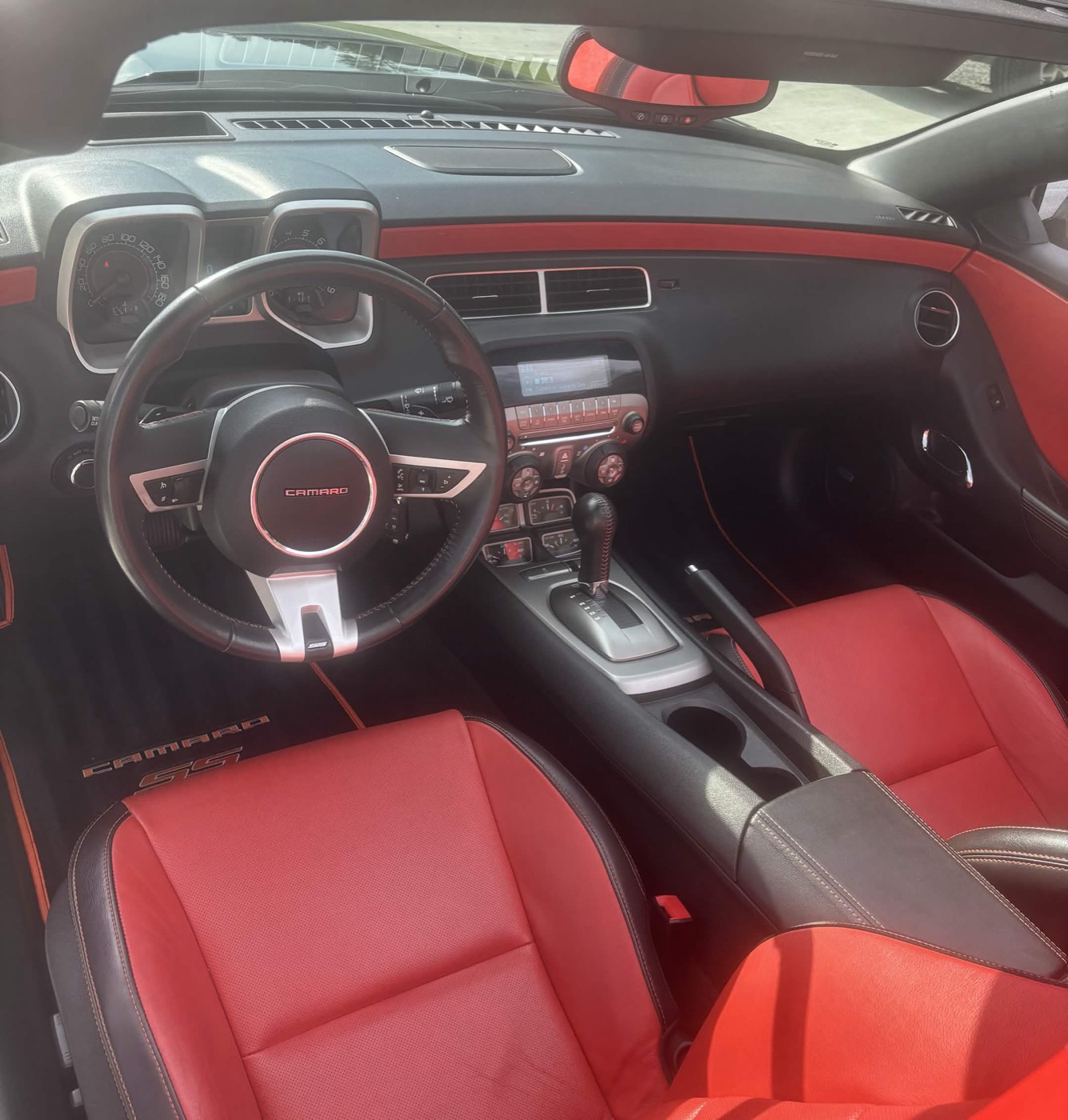 Chevrolet Camaro red and black interior cleaned and detailed by JDM Detailing